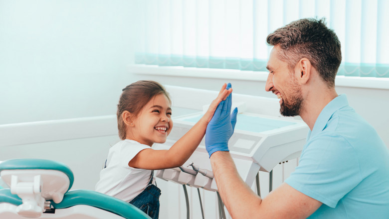How a Dentist in SW Calgary Helps Prevent Cavities in Children